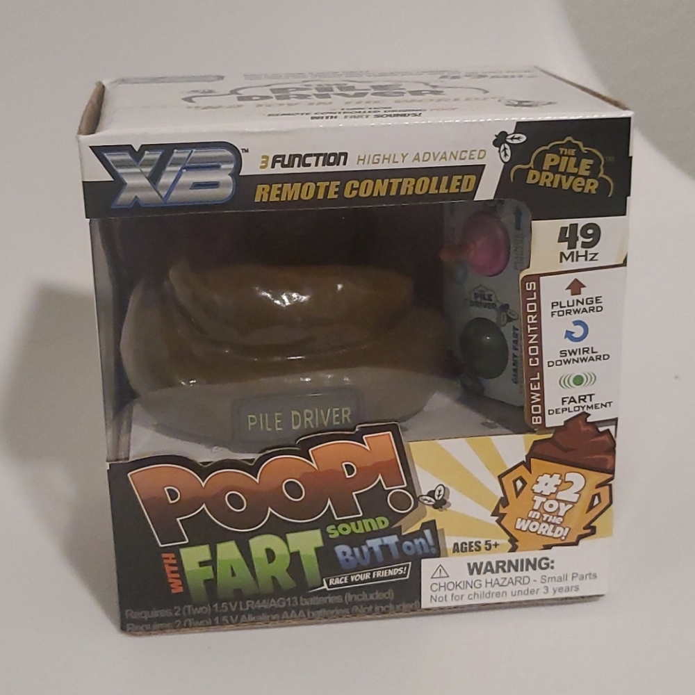 In box pile driver toy
